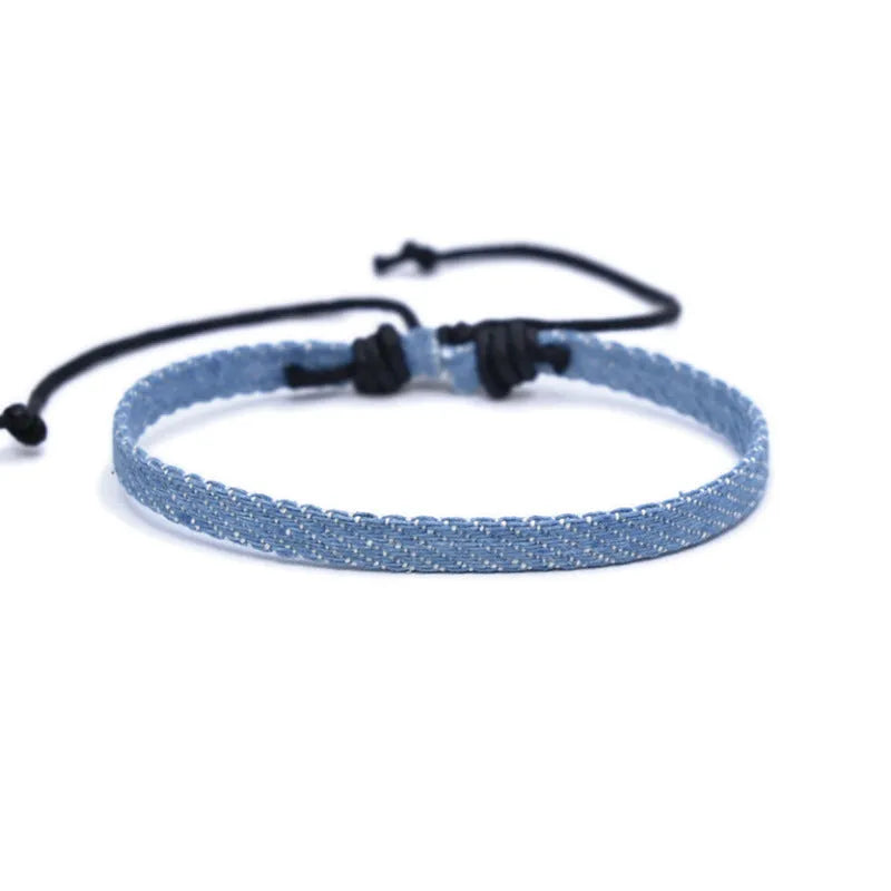 National style denim fabric unisex bracelet carrying strap in a selected colour.