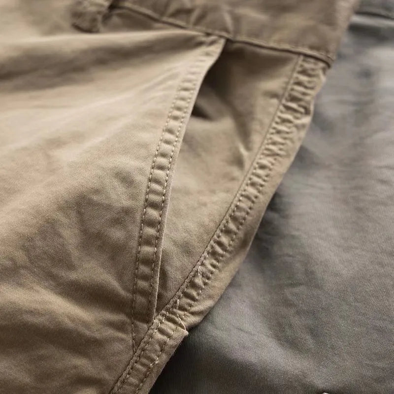 Men's solid colour cotton labour protection trousers with multiple pockets, shown in khaki.