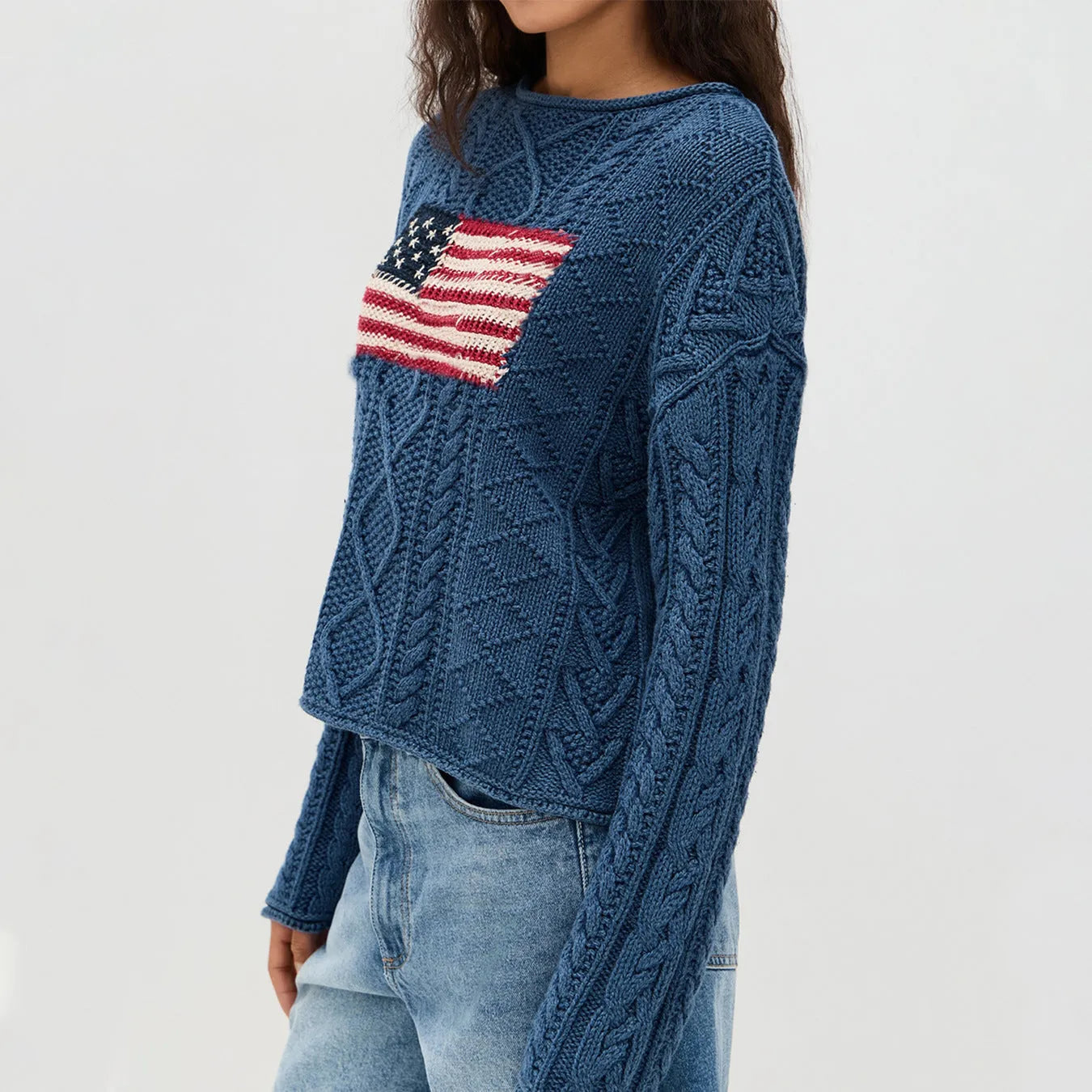 Women's navy blue acrylic fibre pullover top with national flag pattern, long sleeves, front view