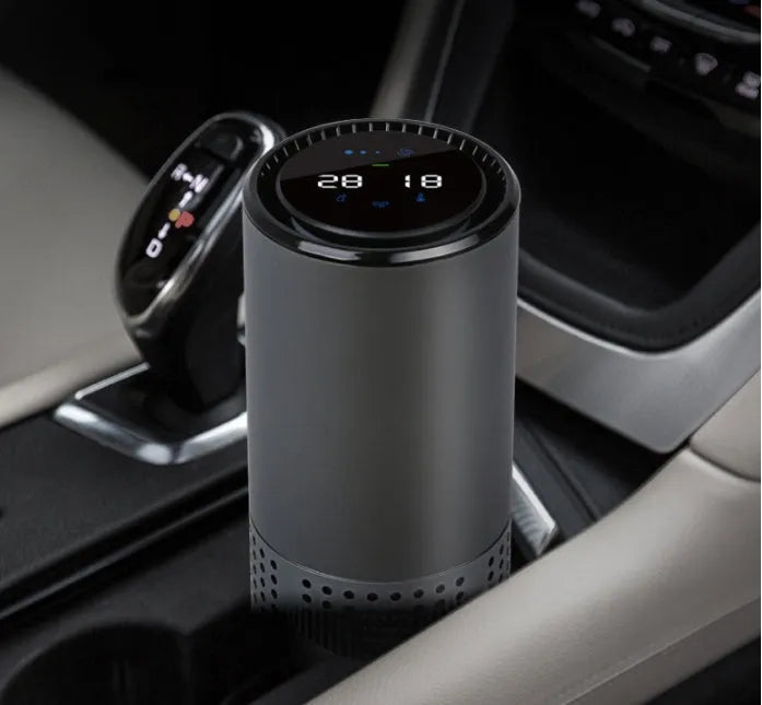 Aluminium alloy car air purifier with display screen, USB cable, suitable for cup holder use.