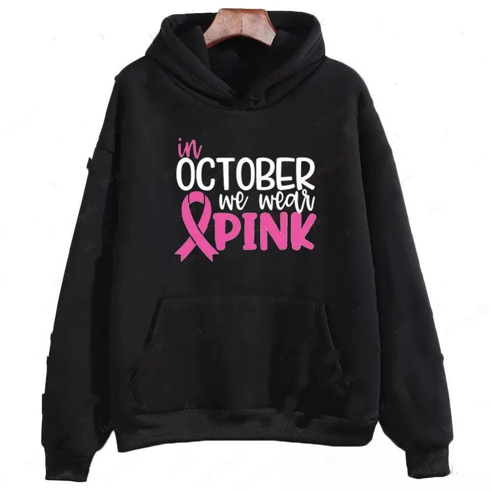 A unisex black pullover sweatshirt with retro graphic artwork and a side seam pocket.