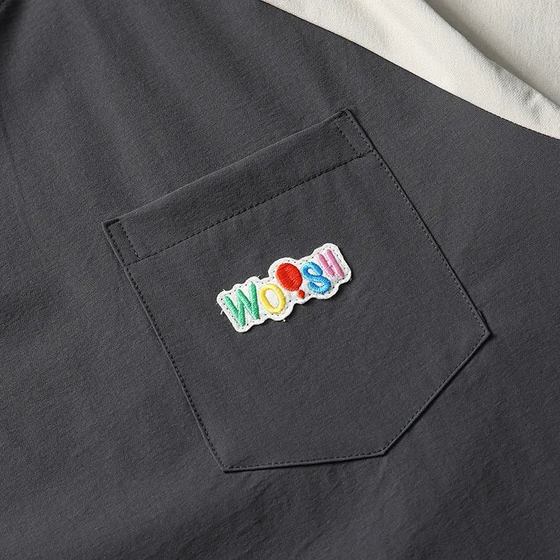 Dark grey men's t-shirt with contrast colour raglan sleeves and loose fit design