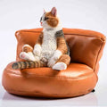 Lazy Cat resin figurine on a small sofa, a 7.5cm car dashboard ornament.