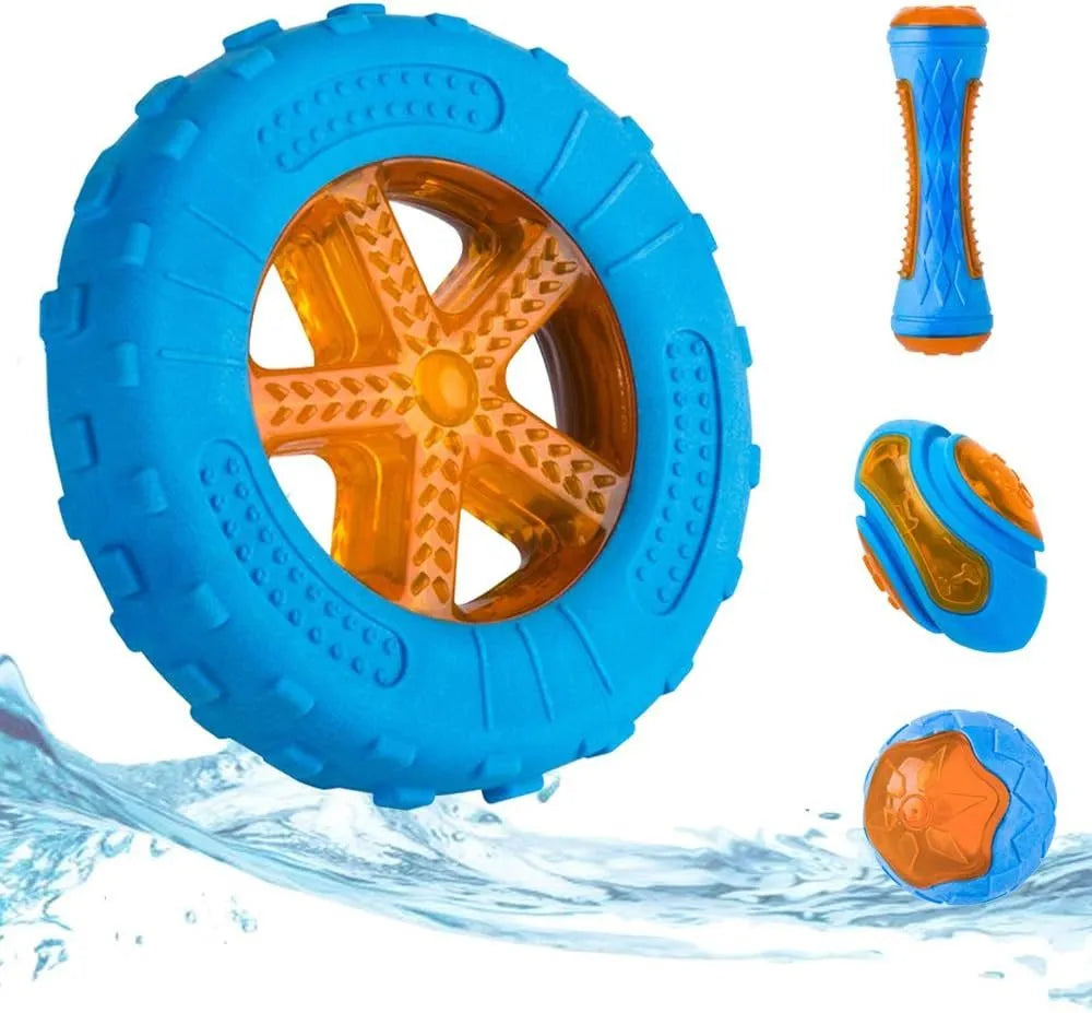 Set of three floating TPR dog toys: a blue ball, an orange barbell, and green tyres on a pool edge.