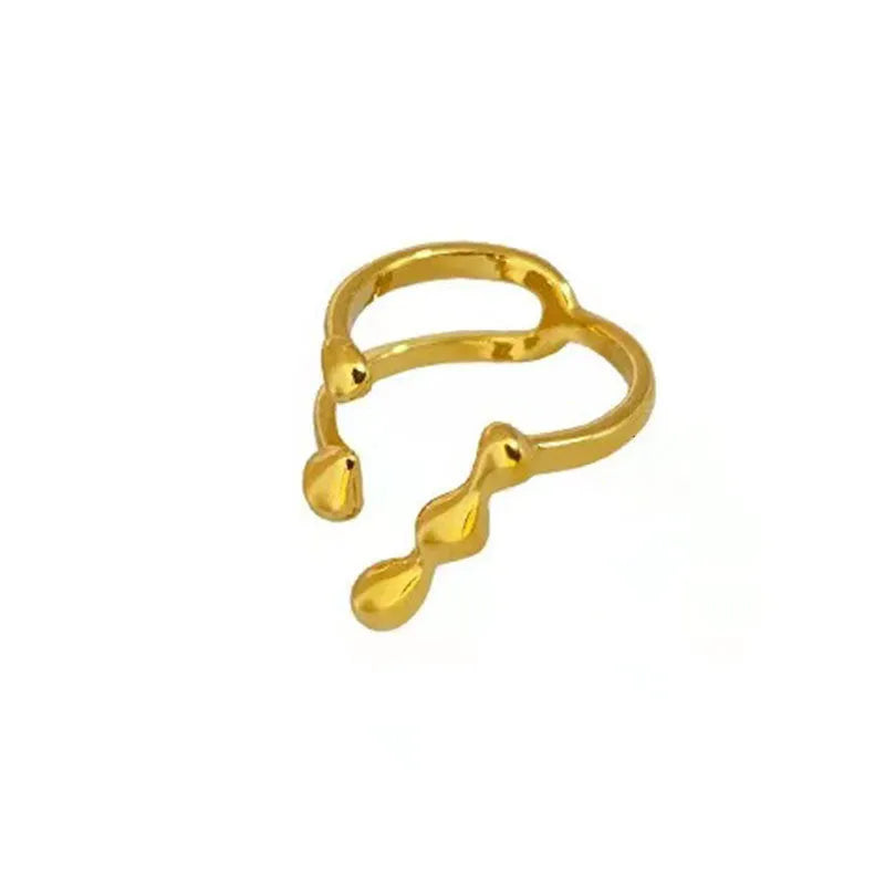 Adjustable brass opening ring with circular sphere element in gold or silver finish