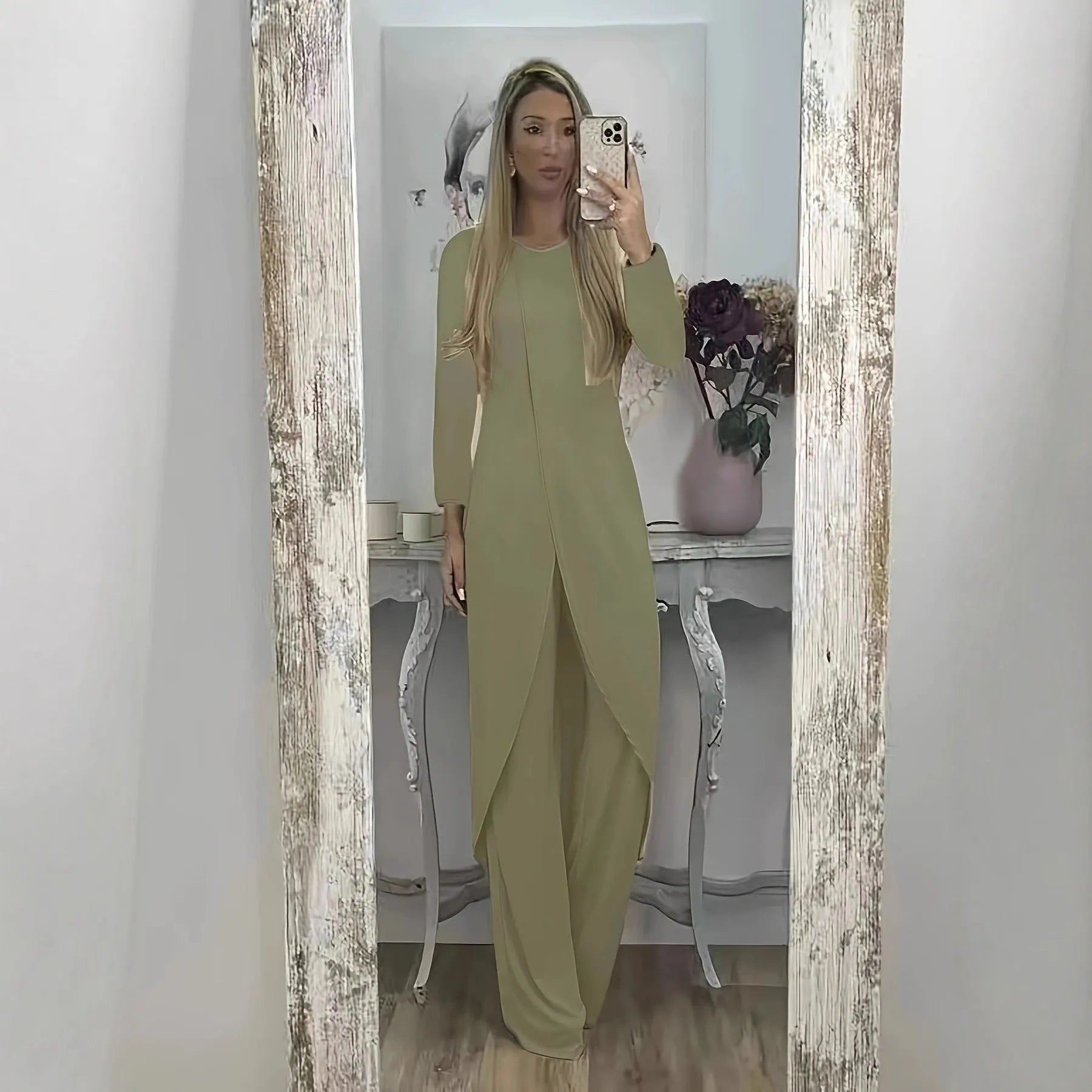 A loose-fitting long sleeve two-piece lounge set in polyester, shown in khaki colour, consisting of a round-neck top and matching trousers.