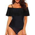 Black one-piece swimsuit with cut-out detail and ruffled straps on a tube top.