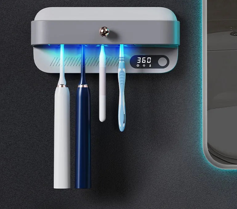 White wall-mounted smart toothbrush steriliser holder with UV light and space for 6 toothbrushes