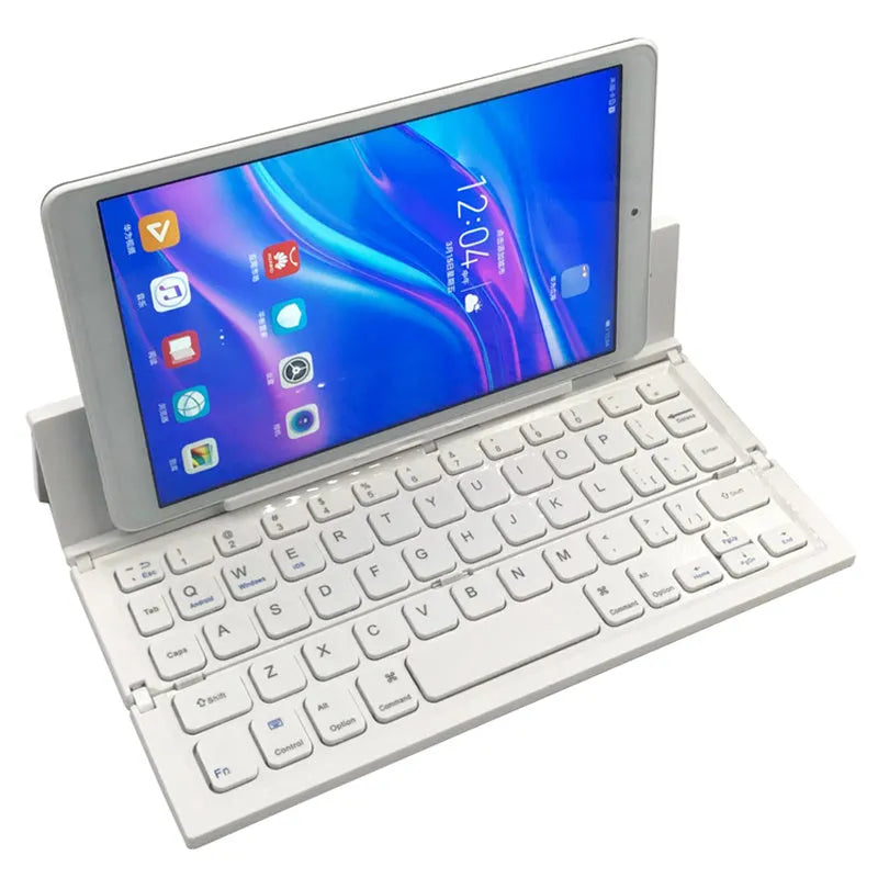 Black foldable Bluetooth keyboard shown alongside tablet demonstrating portable design