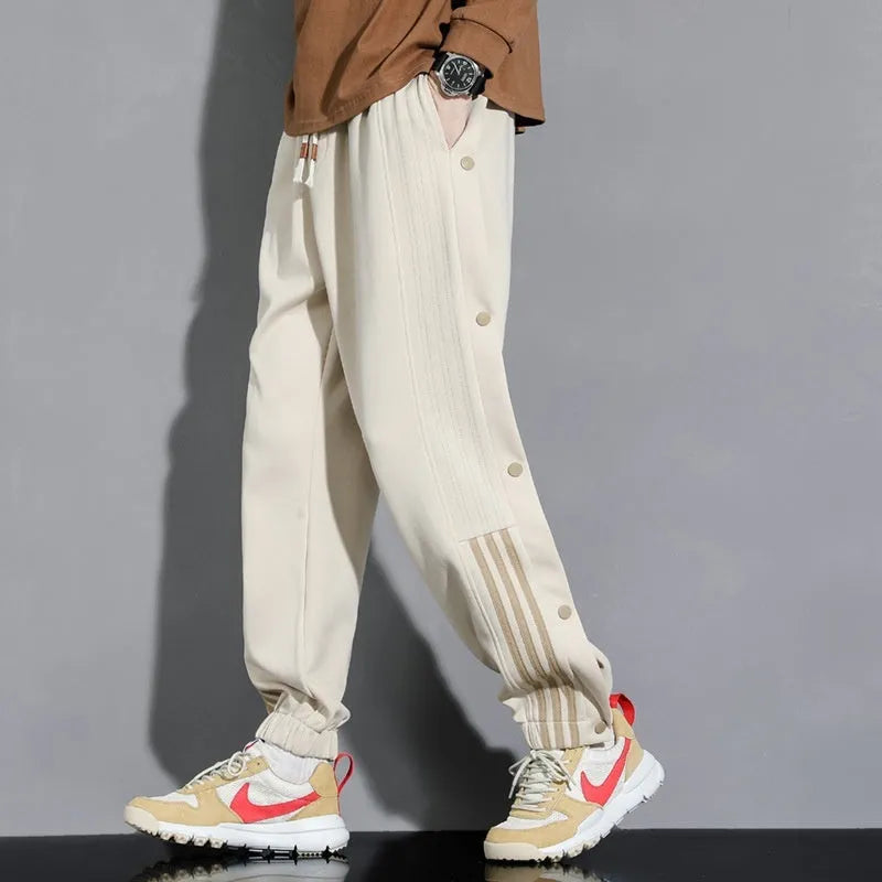 Men's loose fit cotton blend sports trousers with ankle tie fastenings and drawstring waist