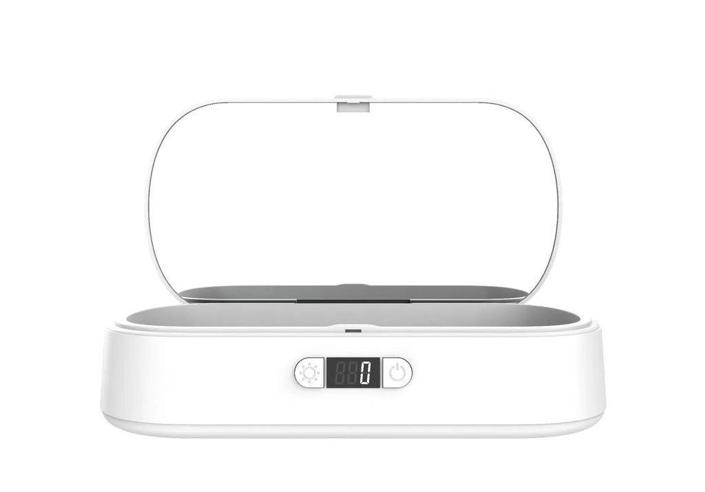White ABS UV steriliser and wireless charging box for mobile phones and toothbrushes.