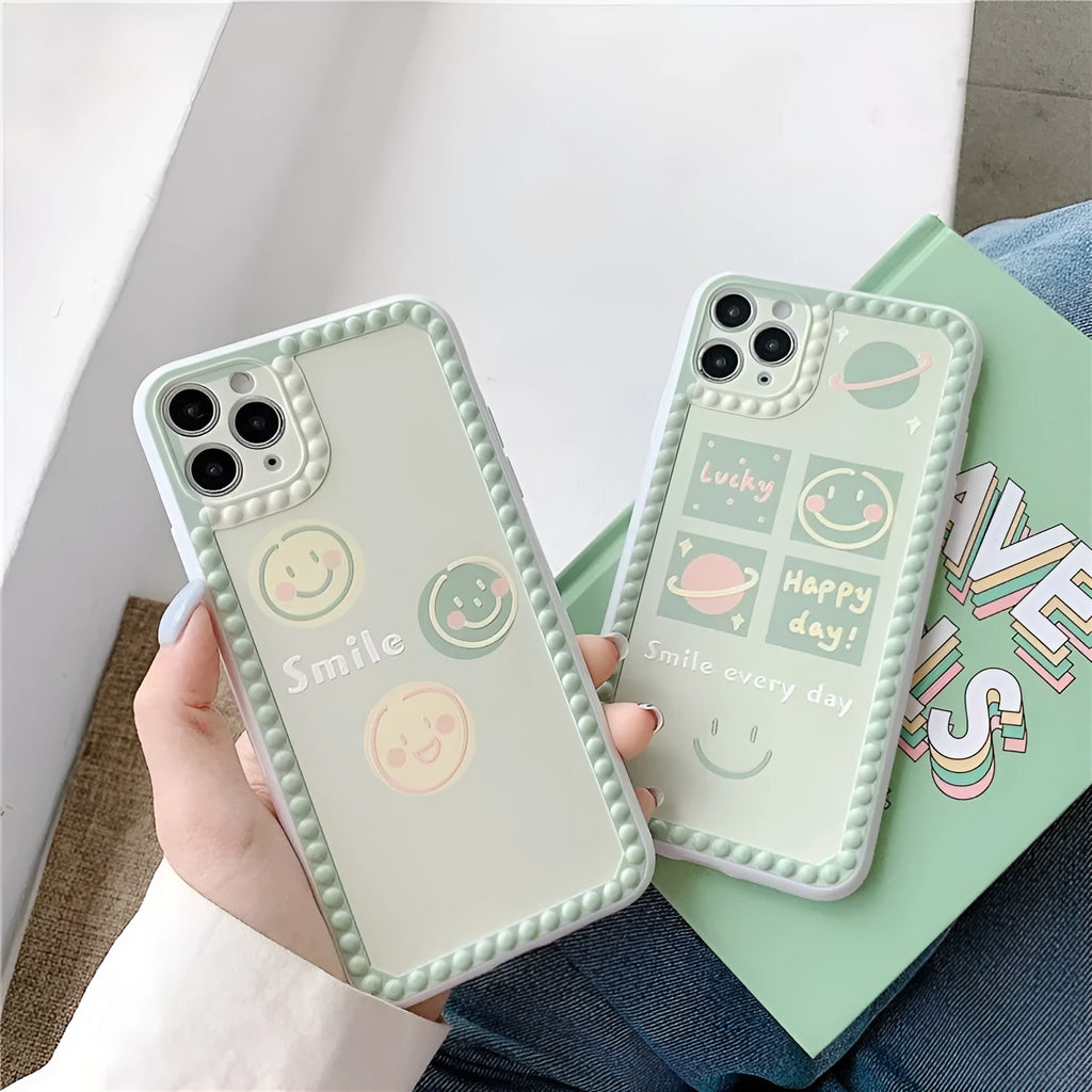 Green TPU iPhone case with polka dot frame and colourful smiley face geometry patterns