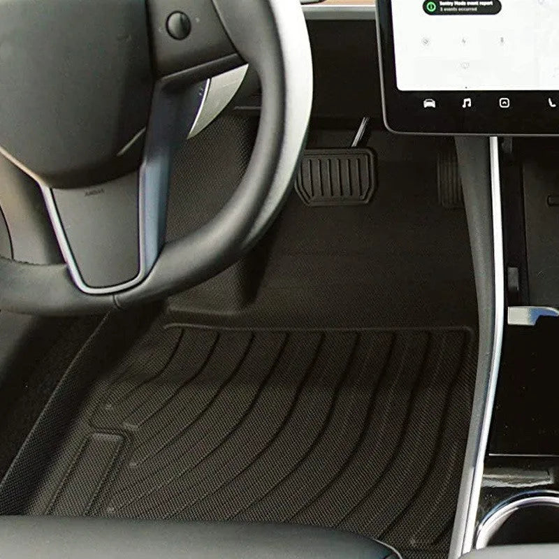 Rubber car floor mat for Tesla vehicles with TPE footrest section