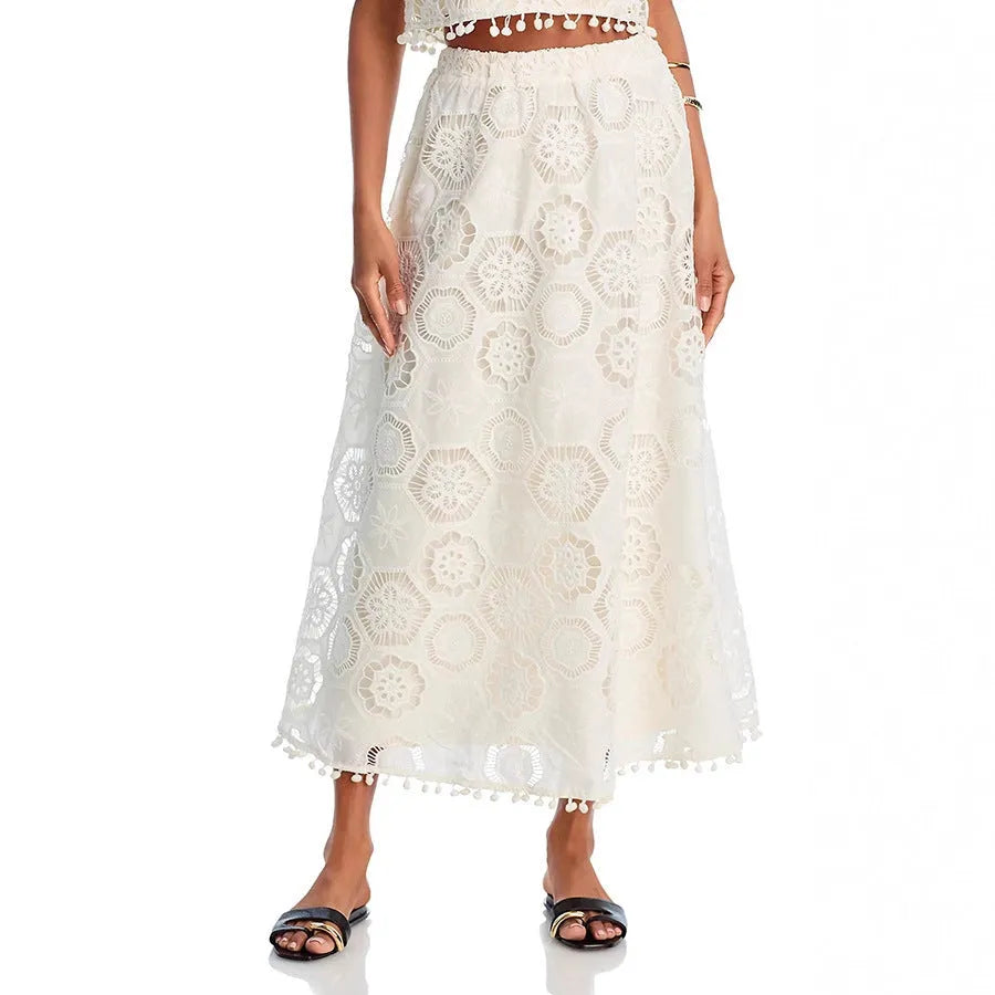 White women's sleeveless top and long skirt suit with retro embroidery design