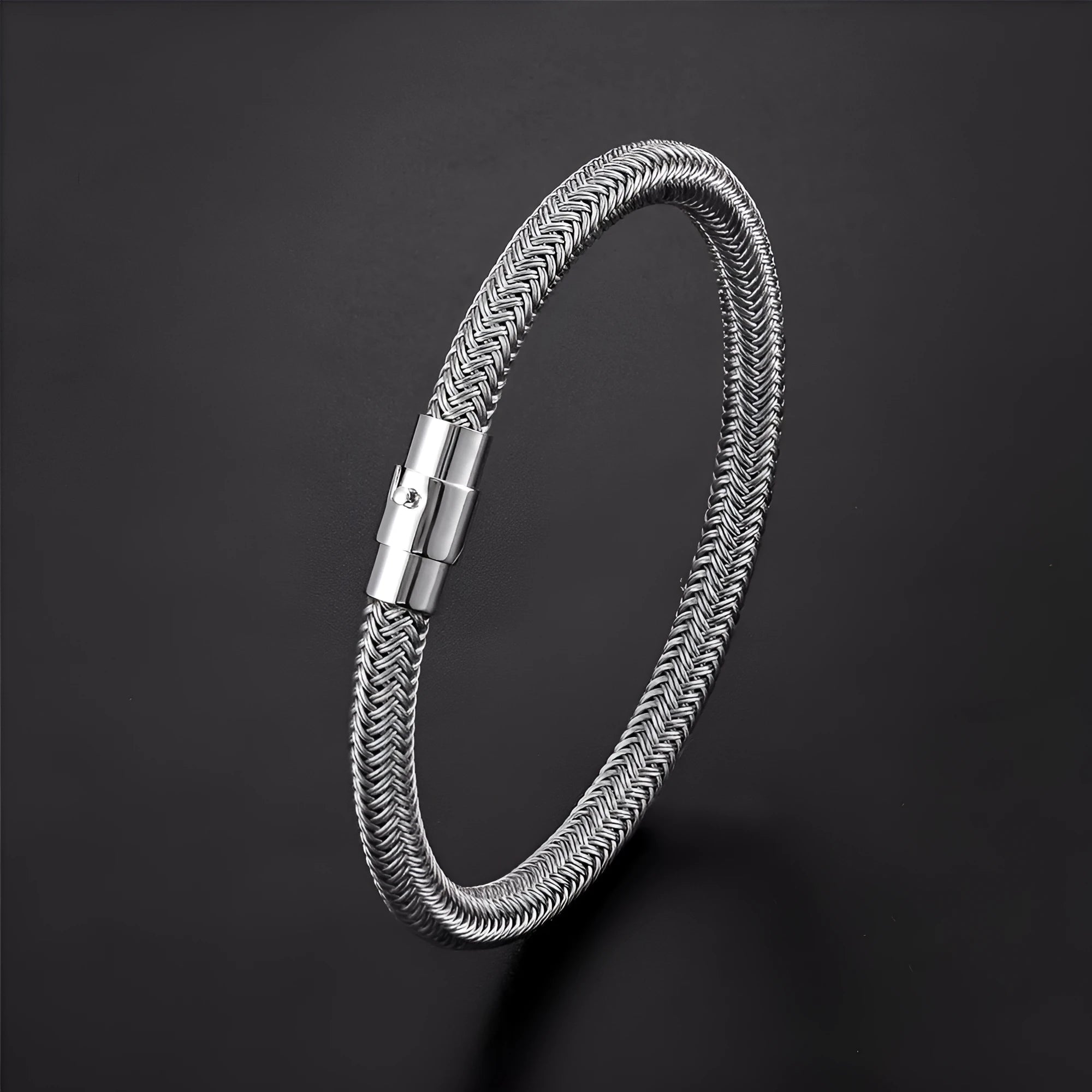 Titanium steel geometric wire bracelet with magnetic clasp shown in silver tone