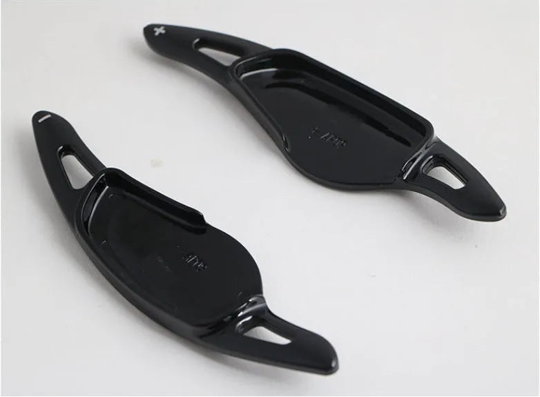 Carbon fibre steering wheel paddle shifter modification kit in black carbon finish