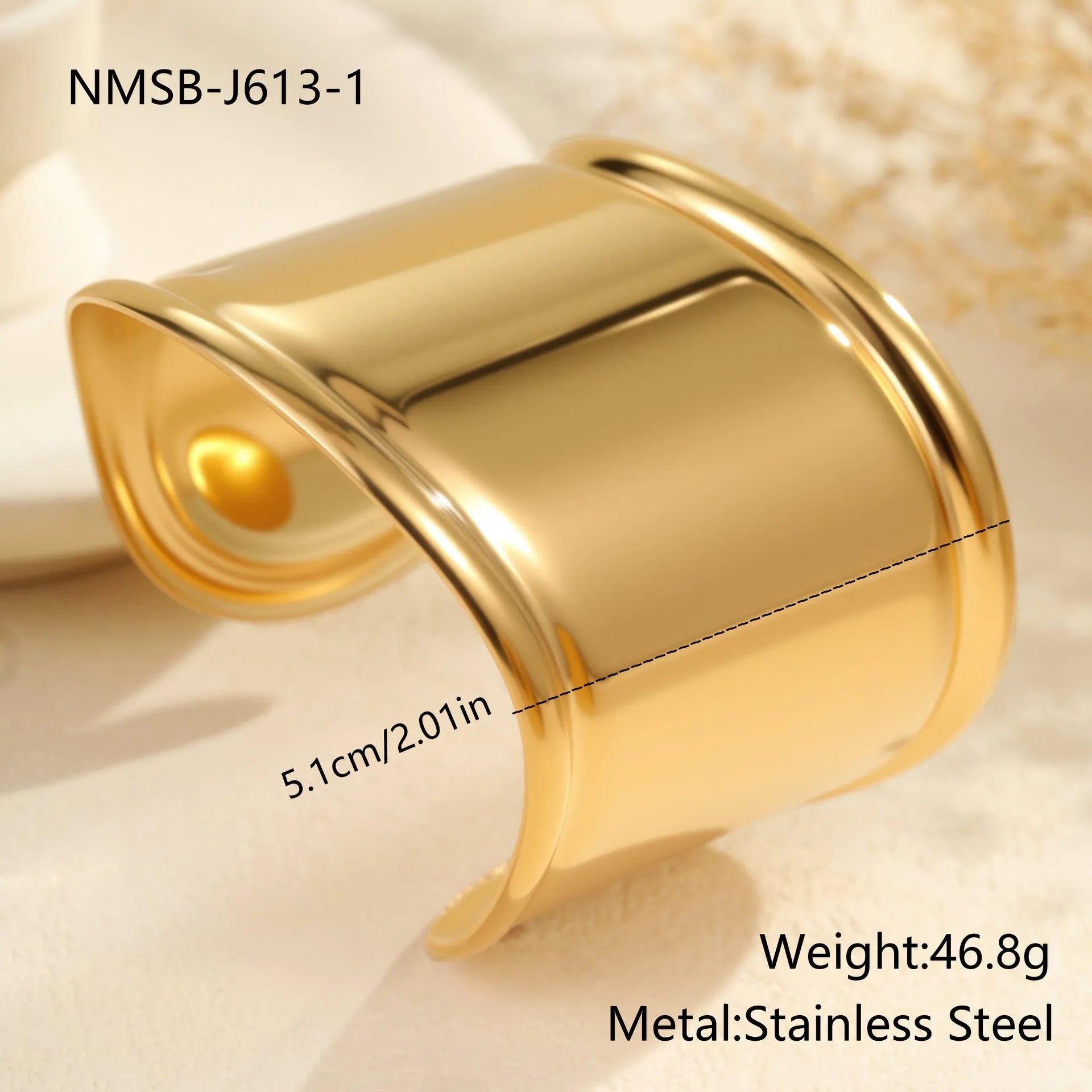 Women's wide cuff bracelet with gold plating and exaggerated niche opening in asymmetric wave design