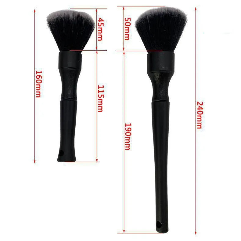 Black car detailing brush with ultra-soft pig hair bristles and a plastic handle.