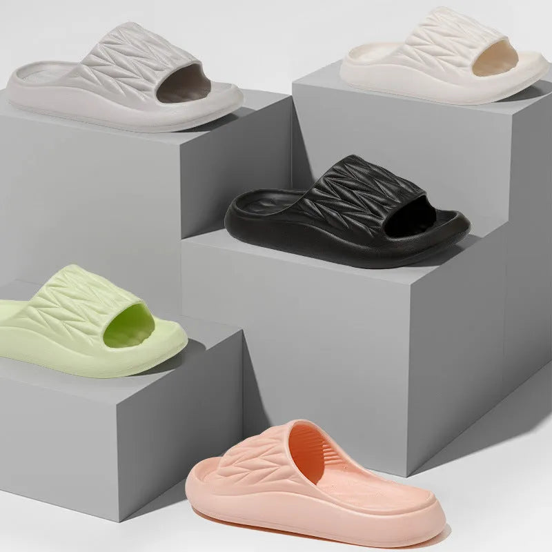 Leaf texture design EVA indoor slippers in multiple colours on a white background.