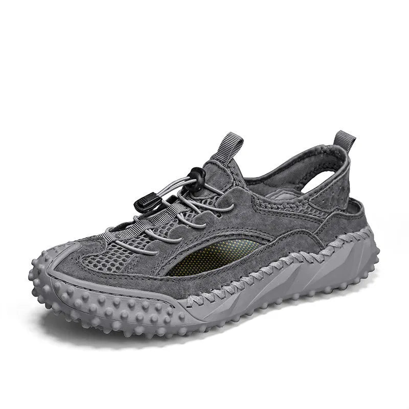 Men's black hollow sports sandals with leather mesh upper, rubber sole, and elastic band closure