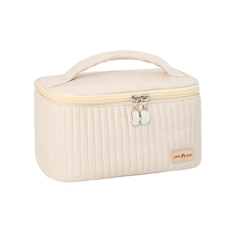 Open-top PU leather makeup bag in a pastel colour from a range of six options.