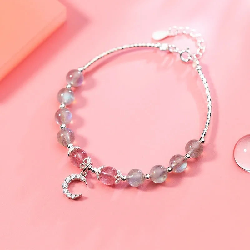 Natural moonstone bracelet with crescent moon charm and adjustable silver chain for women
