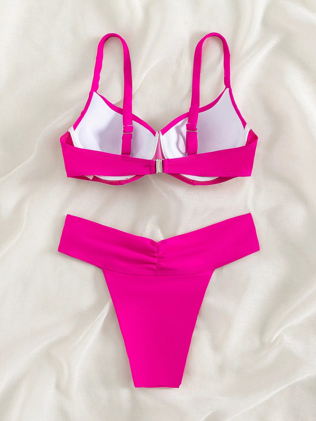 Solid colour bikini swimsuit with briefs style and polyester lining in fluorescent colours