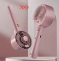 Ceramic white pet grooming brush with mist spray function and UV-C sterilisation light for dogs and cats.