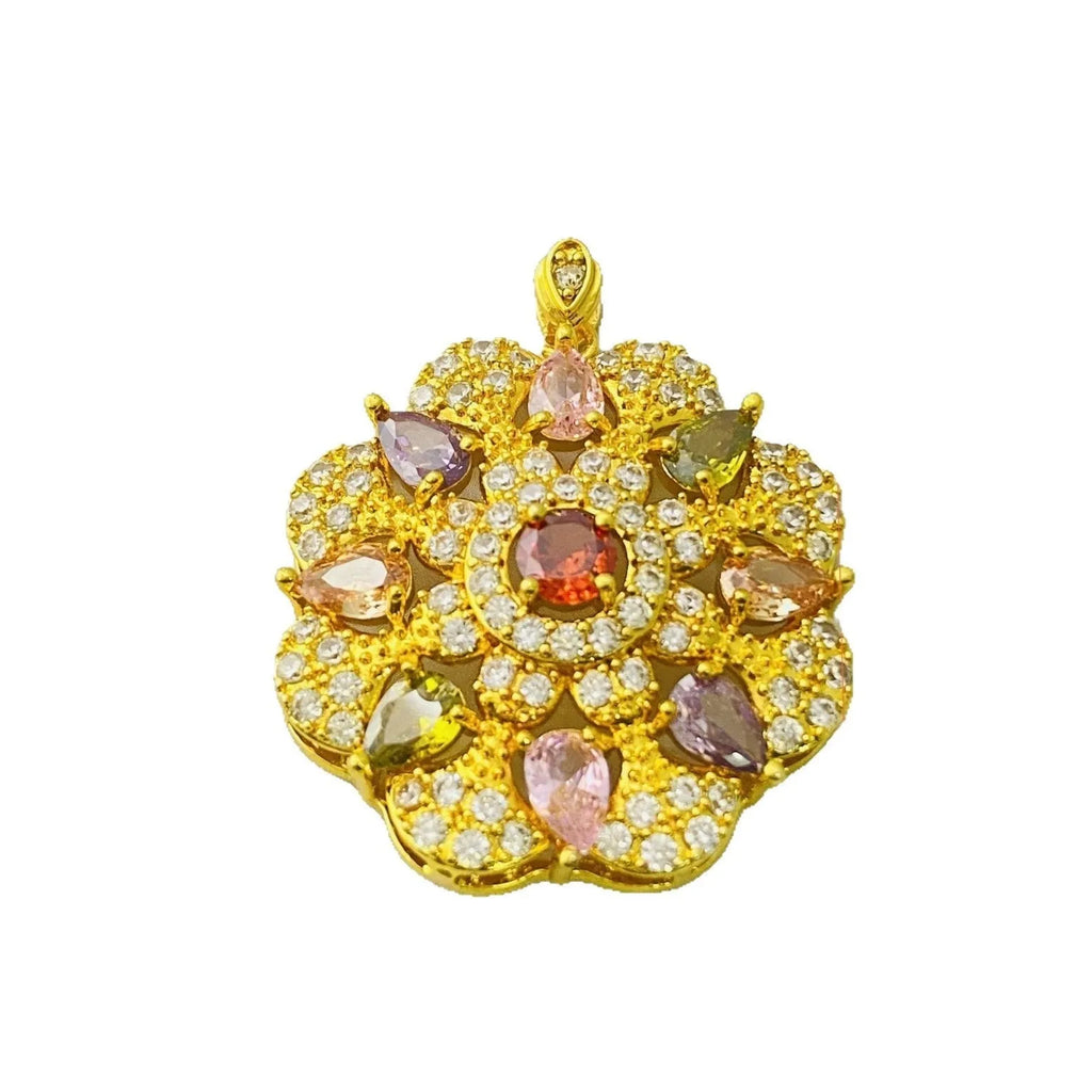 Women's flower-shaped zircon pendant necklace in gold tone on a model.