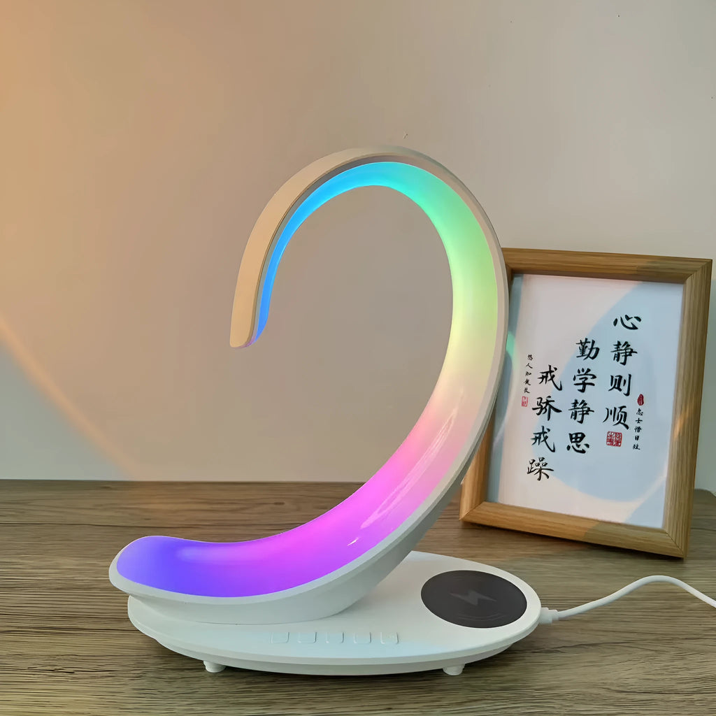 White swan decorative lamp with wireless charging pad and Bluetooth speaker functionality