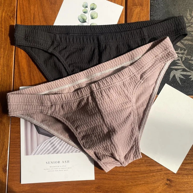 Men's cotton briefs in solid colours showing mid waist and triangle design