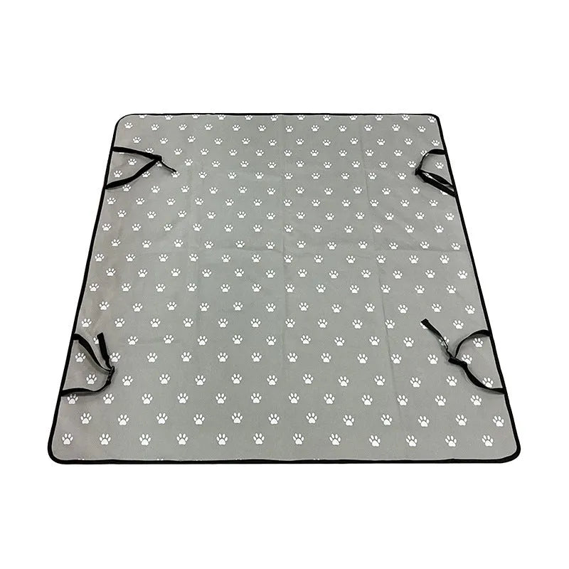 Washable cloth car pet mat for rear seat protection with dog bone print design.