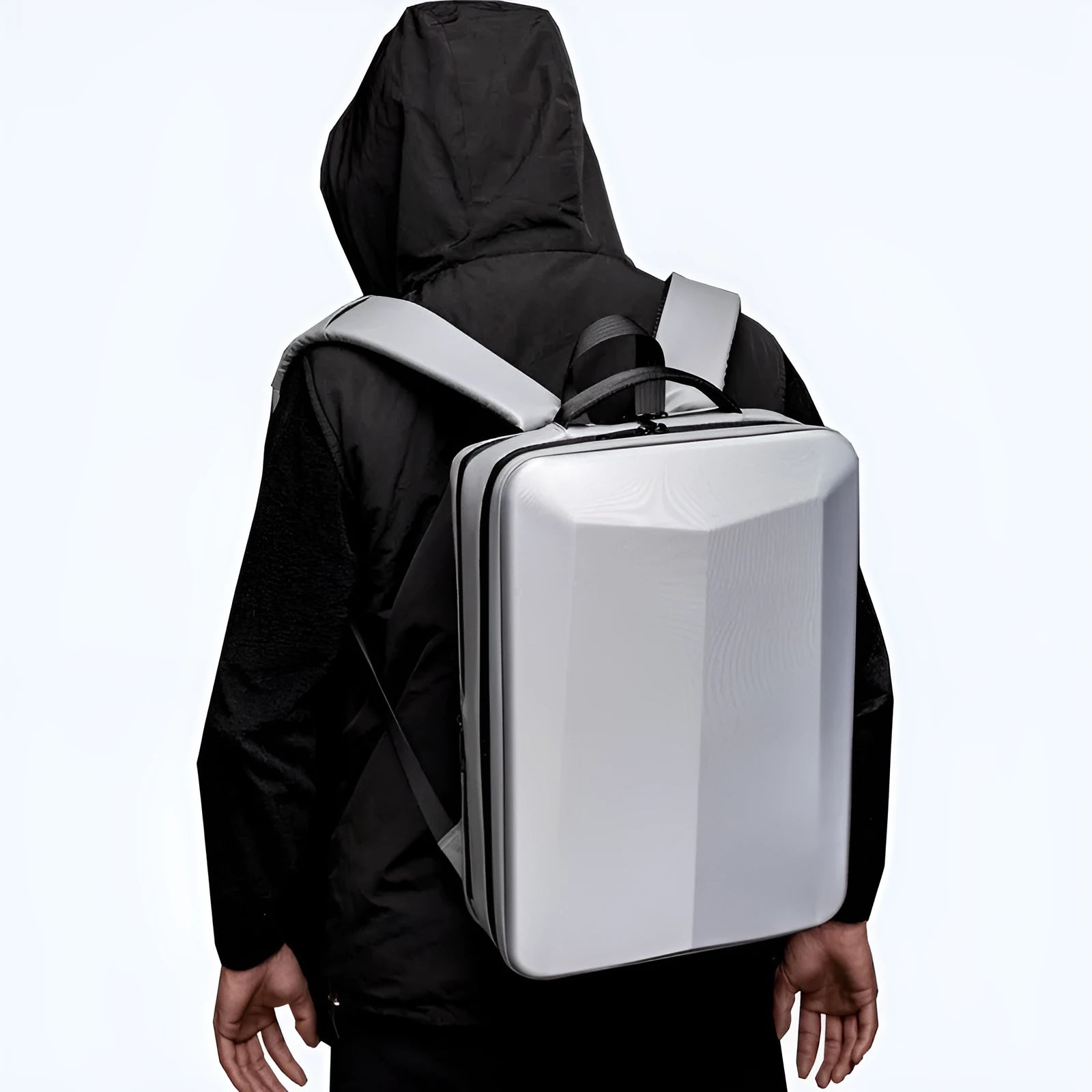 Black and silver white waterproof ABS PC business backpack with curved straps, shown with a laptop.