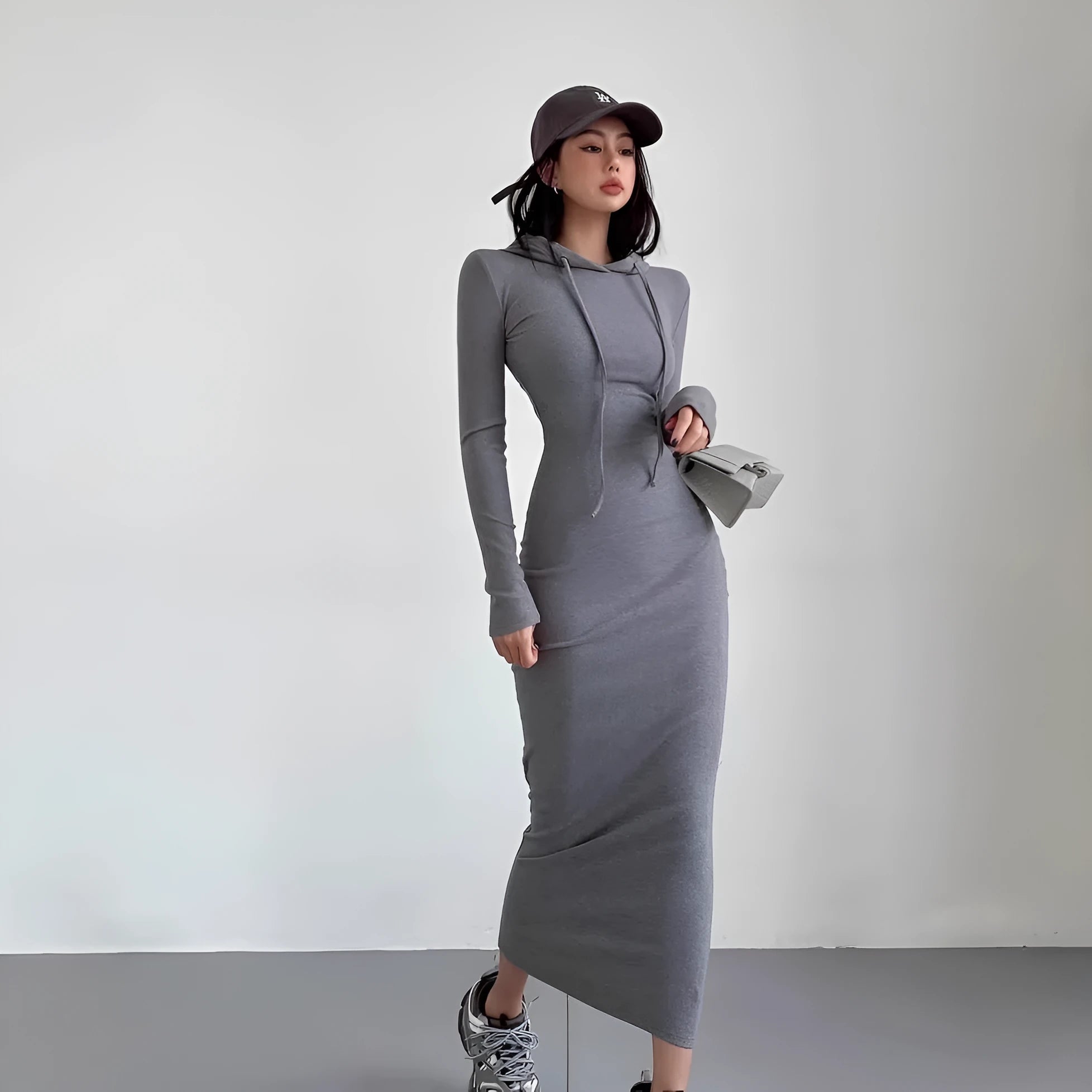 Women's grey hooded long sleeve sheath dress with high waist, shown knee-length.