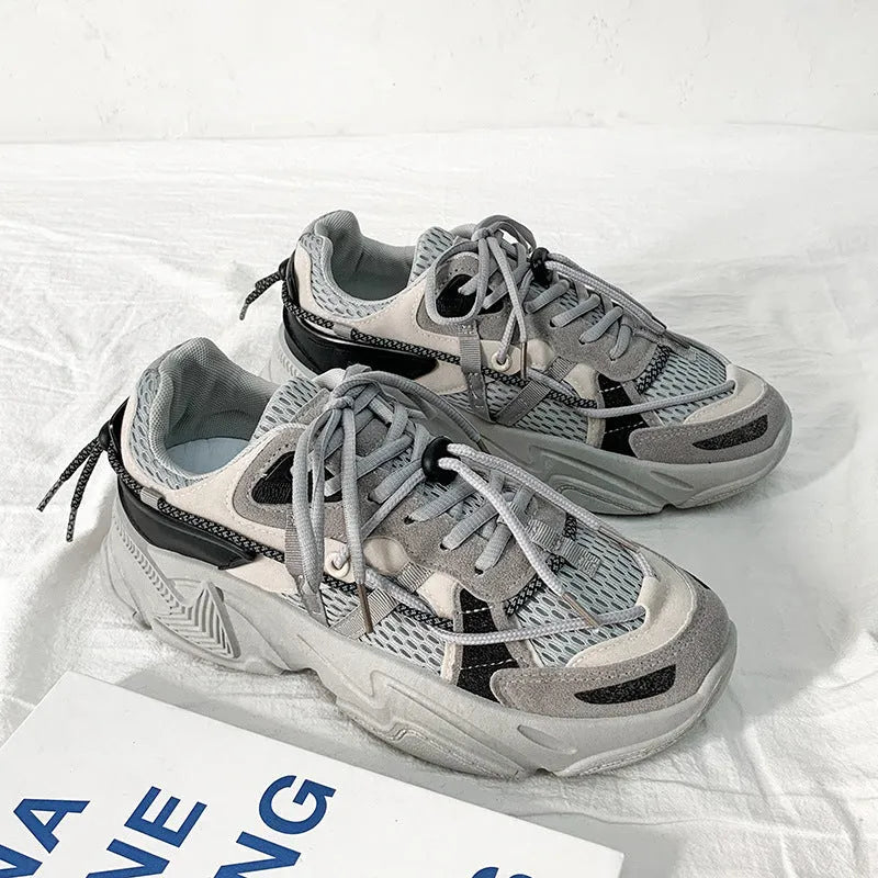 Men's platform dad shoes in black, white, or grey with a lace-up front and a thick sole.