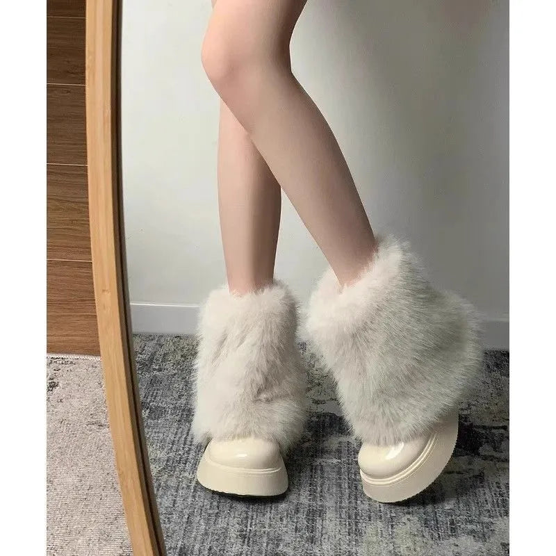 Women's black fleece-lined snow boots with rubber sole and mid heel