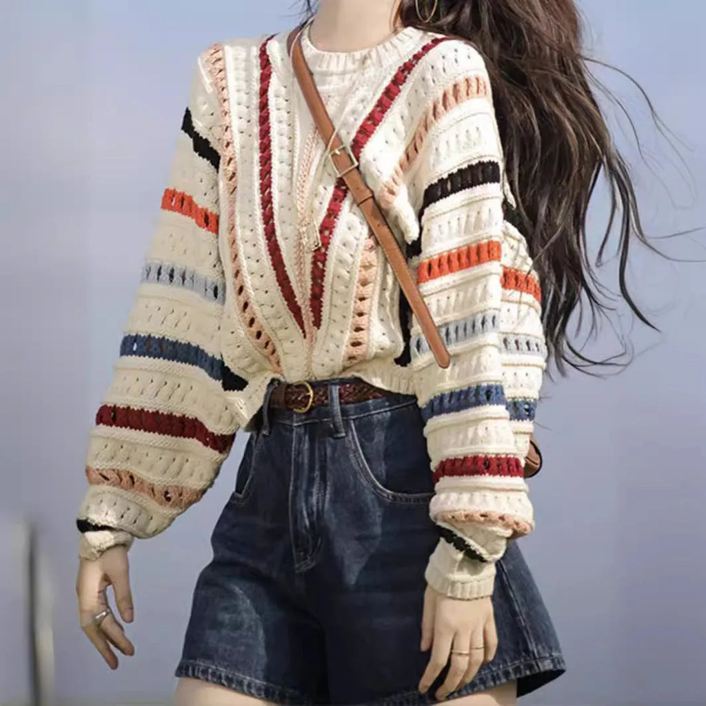 Rainbow striped pullover sweater with batwing sleeves and round neck in loose fit casual style