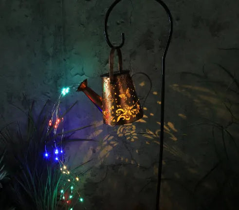 Butterfly pattern solar garden lamp with tapered iron construction and warm white LED lighting