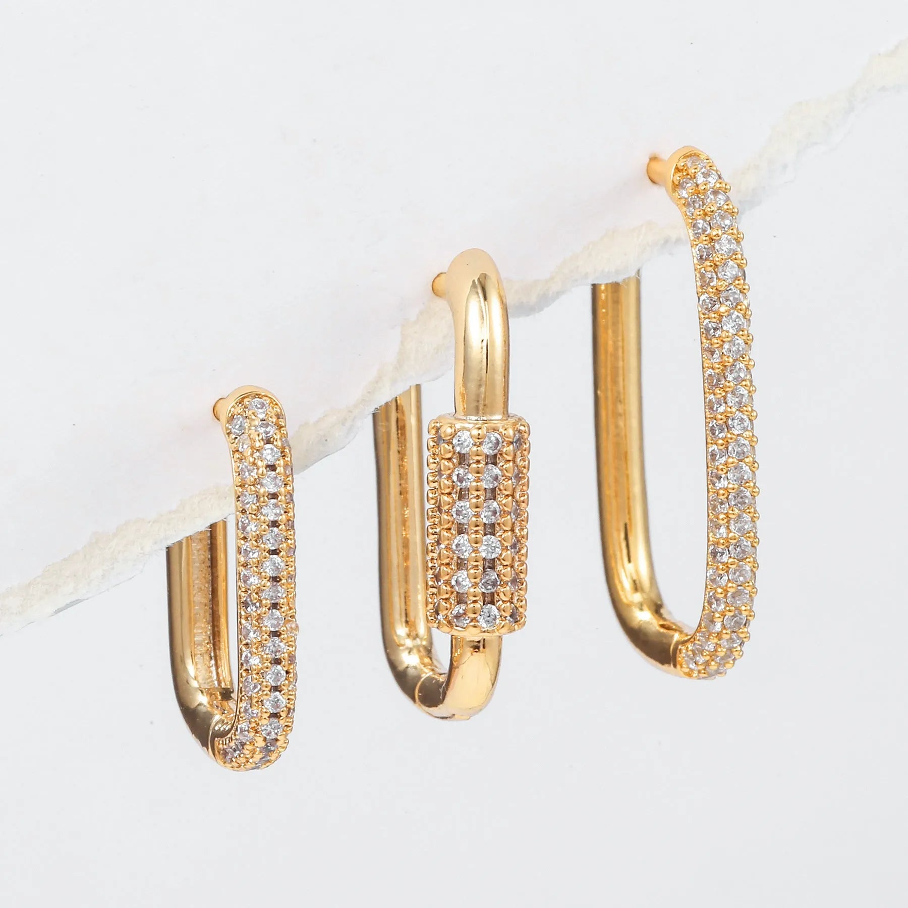 Copper geometric earring set with three square ear clips featuring inlaid zircon stones