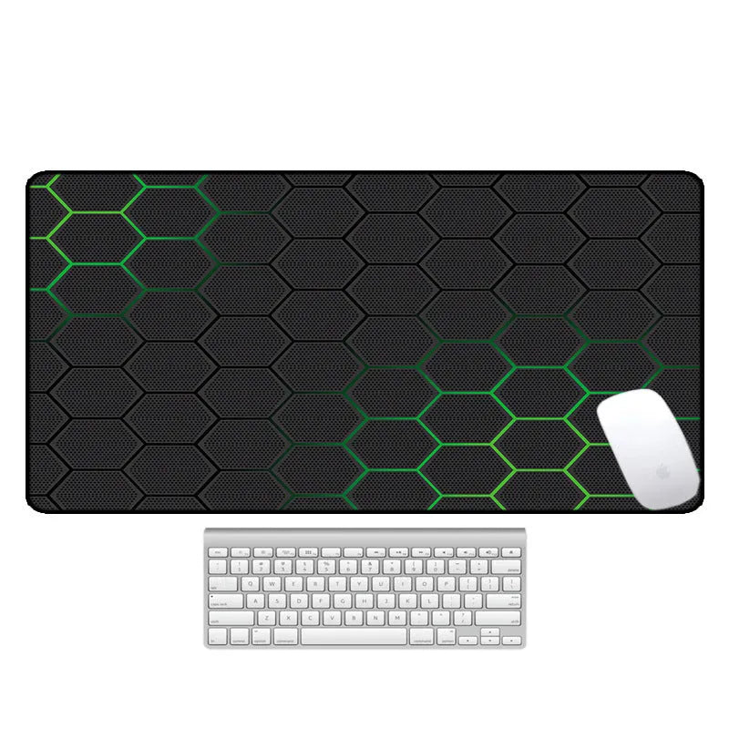 Large thermal transfer printed mouse pad with natural rubber non-slip base on a desk.