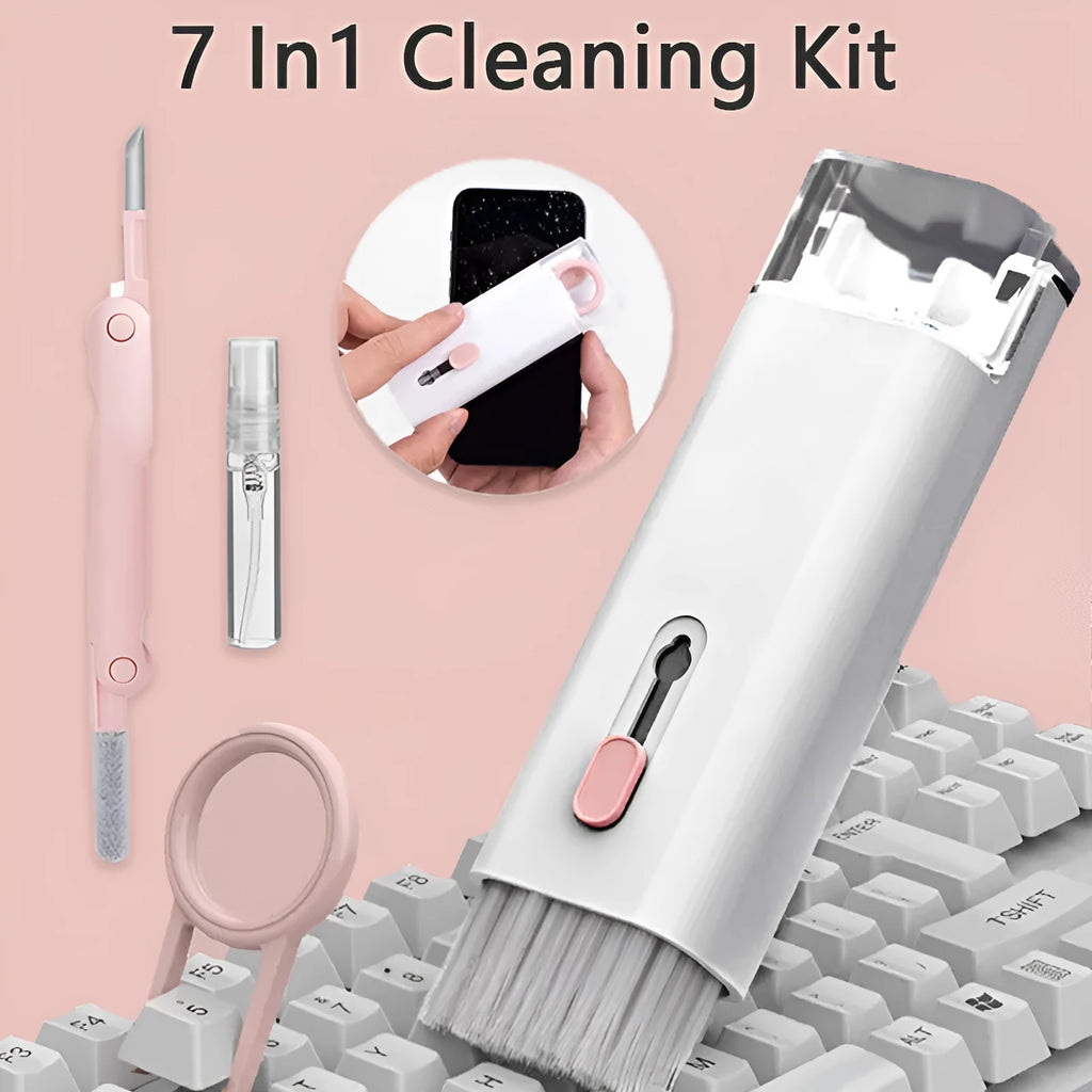 White cleaning set with pen, brush, keycap puller, and spray bottle on desk