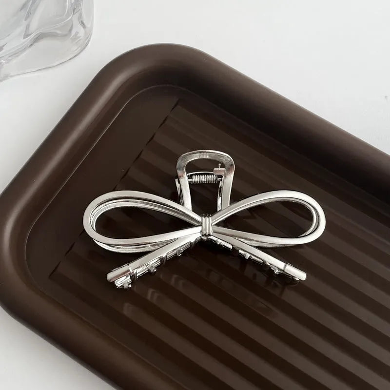 Silver metal hair barrette claw clip with electroplated finish and decorative design