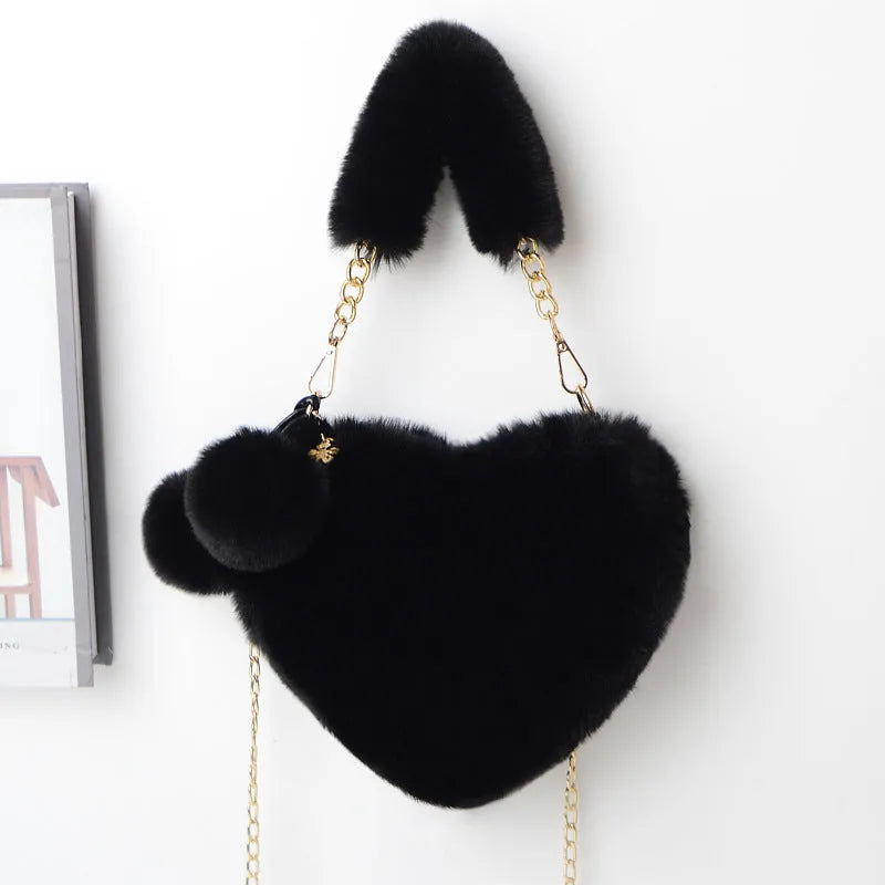 Heart-shaped women's plush handbag with soft texture and detachable shoulder strap in medium size