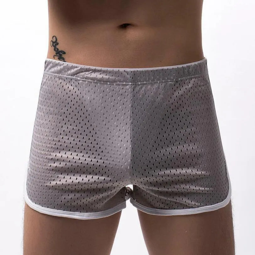 Men's black three-point boxer shorts made from a cotton and nylon blend fabric.
