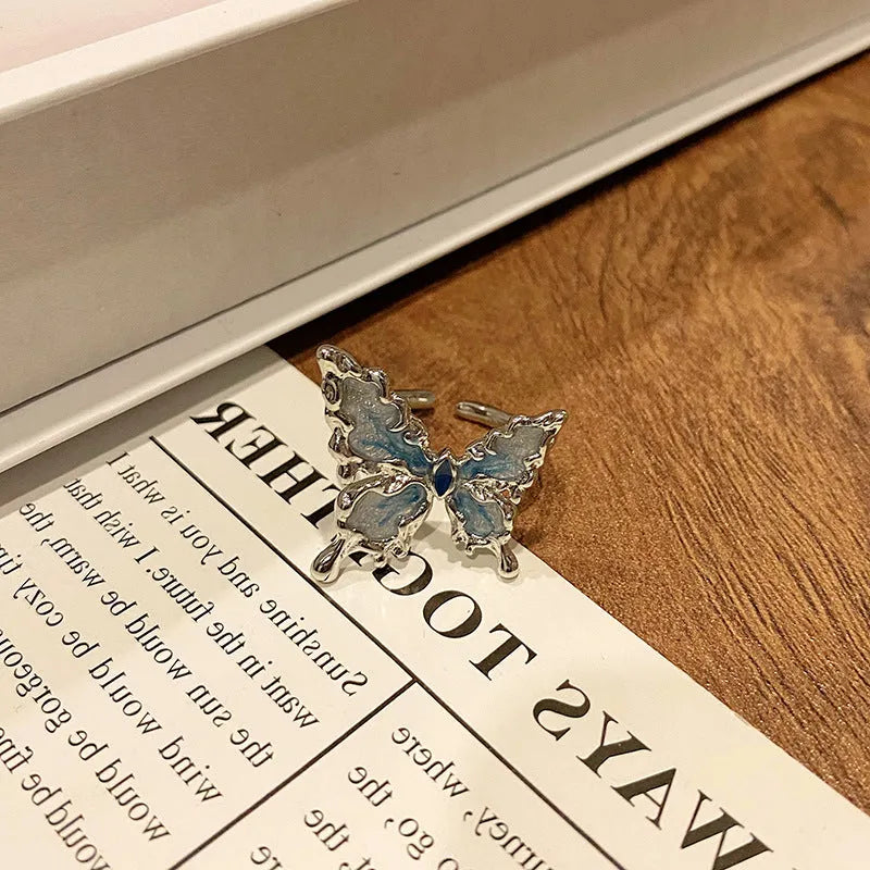 Copper Chinese butterfly women's ring showing creative design with oil dripping treatment finish