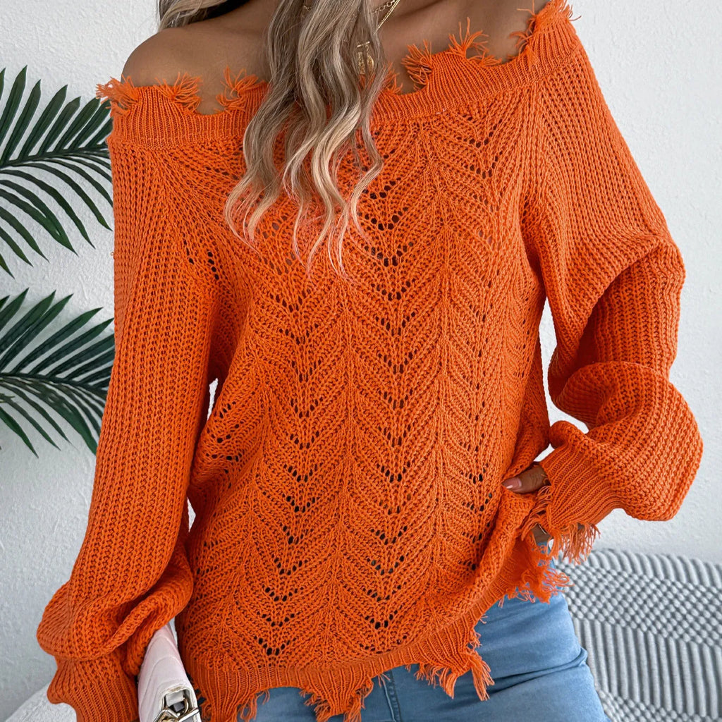 White hollow-out off-the-shoulder pullover sweater with long sleeves on model