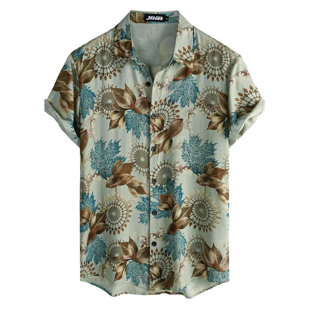 Man wearing a short sleeve lapel collar Hawaiian shirt with a blue floral print.