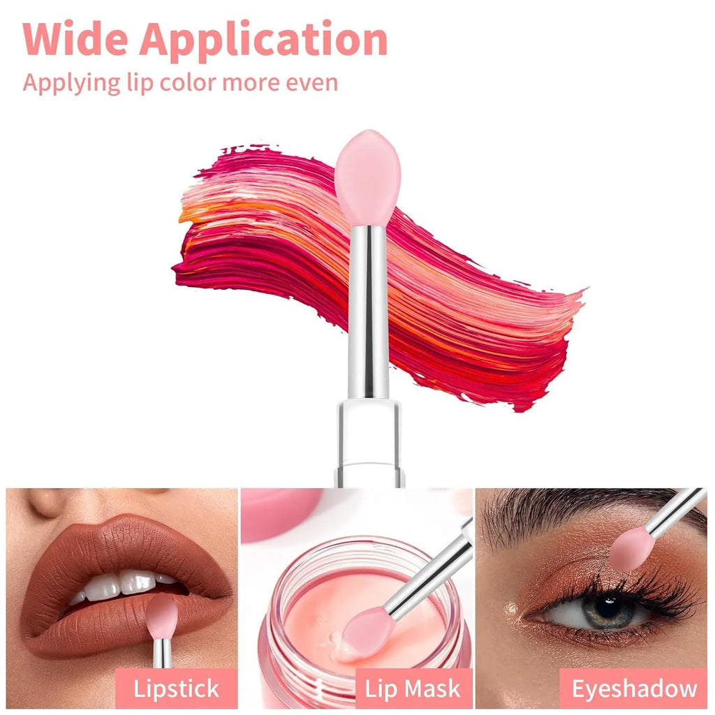 Set of eight colourful reusable silicone lip brushes with hygienic protective caps laid out.