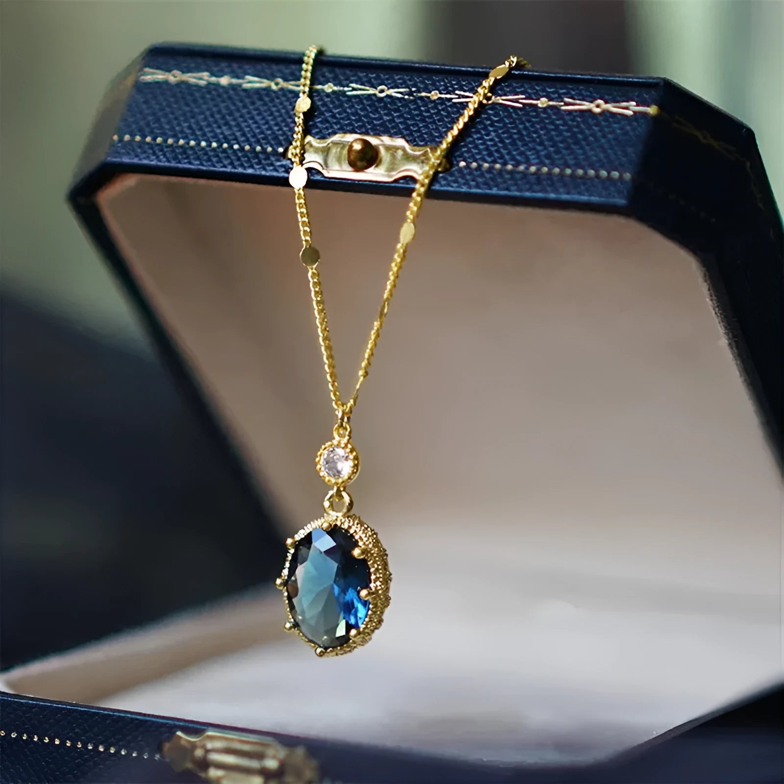 Geometric copper necklace with gold electroplated finish showing French retro design