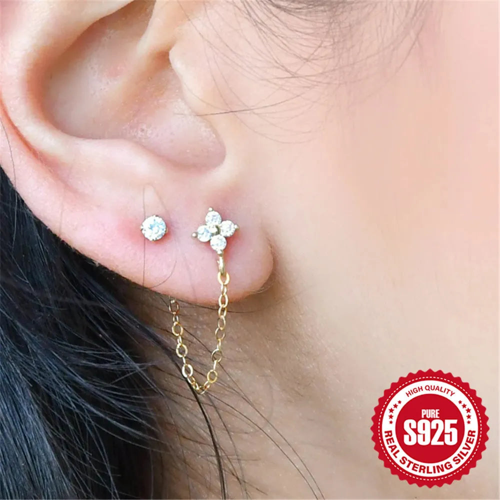 S925 sterling silver geometric stud earrings with a flower and tassel chain design in a gold electroplated finish.